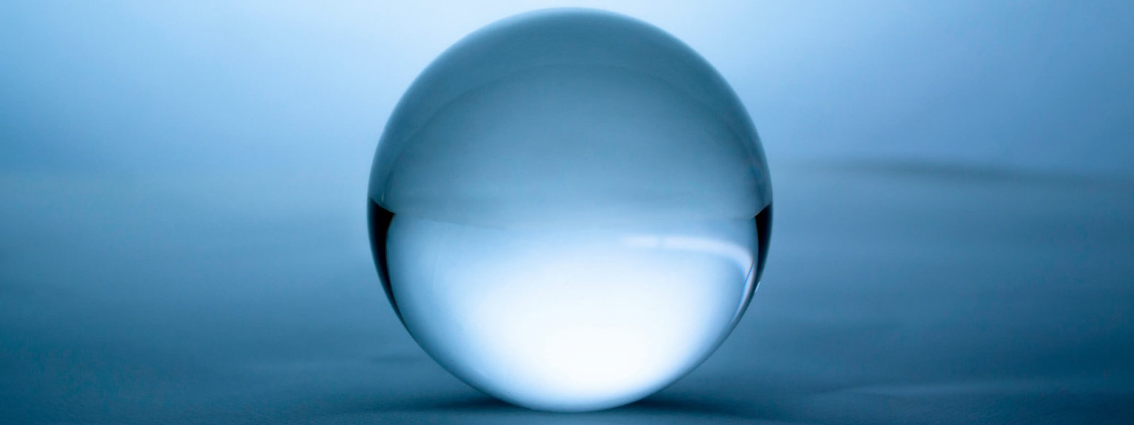 Glass Orb with Blue Background