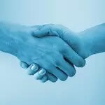 Shaking hands in a blue colored tone.