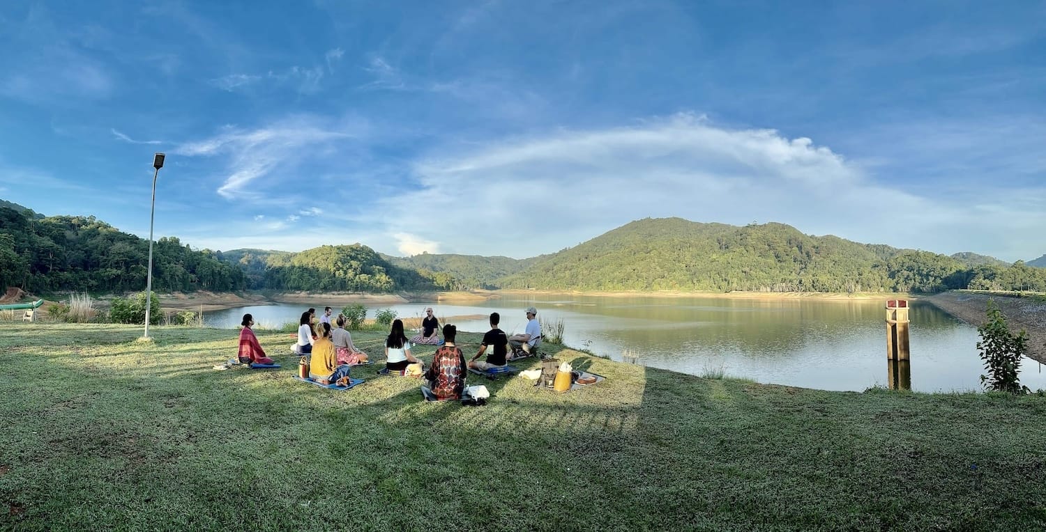 Outdoor meditation session overlooking Bangwaad Reservoir in Phuket