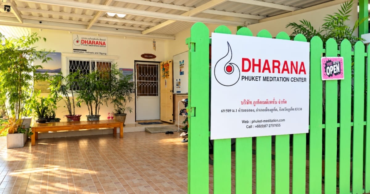 Entrance to Phuket Meditation Center in Chalong with Dharana sign and green gate