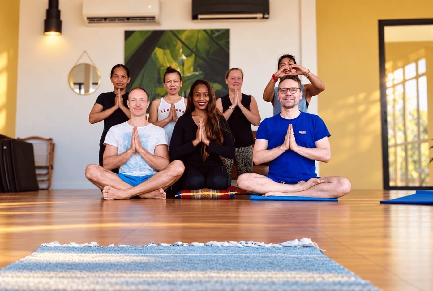 Yoga at Phuket Meditation Retreat - Featured A Group of People practicing Yoga during the Phuket Meditation Retreat